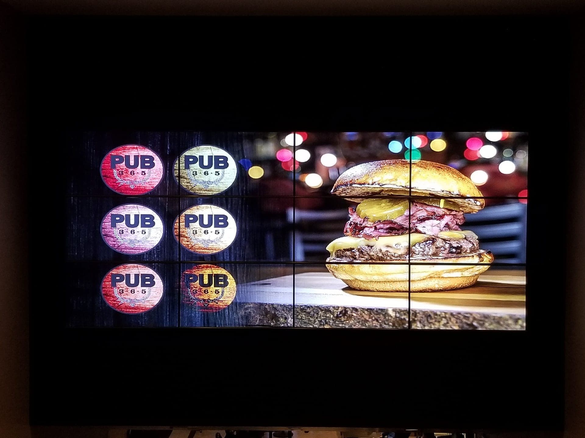 Digital menu board on a 3x3 video wall at Pub 365, Tuscany Hotel & Casino